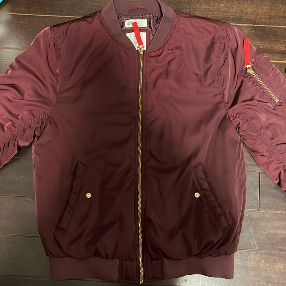 A bomber jacket. It’s good for when it’s not too cold. Easy to style